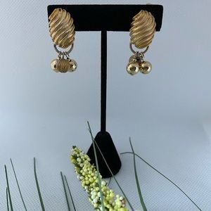 Gold tone shell shape dangling bead, rhinestone silver tone leaf shape clip on